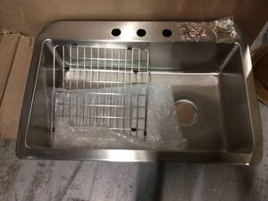 lot 26 image: Avenue Drop-inUndermount Stainless Steel 33 in. Single Bowl Kitchen Sink with Bottom Grid by Elkay Customer Returns See Pictures
