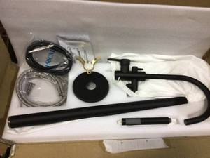 lot 32 image: 1-Handle Freestanding Floor Mount Tub Faucet Bathtub Filler with Hand Shower in Matte Black Customer Returns See Pictures