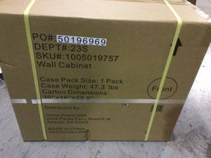 lot 43 image: Heavy Duty Welded 20-Gauge Steel Wall Mounted Garage Cabinet in Black (28 in. W x 22 in. H x 14 in. D) by Husky Customer Returns See Pictures
