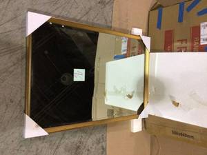 lot 46 image: Calter 23.5 in. W x 35.5 in. H Framed Rectangular Beveled Edge Bathroom Vanity Mirror in Gold Customer Returns See Pictures