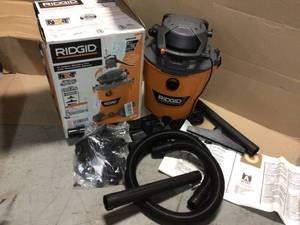 lot 54 image: 12 Gal. 6.0-Peak HP NXT WetDry Shop Vacuum with Detachable Blower, Filter, Dust Bag, Hose and Accessories by RIDGID Customer Returns See Pictures