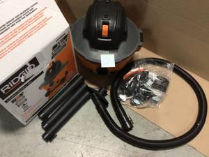 lot 61 image: 6 Gal. 3.5-Peak HP NXT WetDry Shop Vacuum with Filter, Hose and Accessories by RIDGID Customer Returns See Pictures