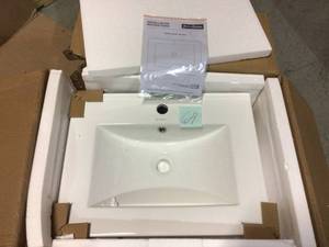 lot 64 image: 24 in. Ceramic Single Faucet Hole Vanity Top in White with White Basin Customer Returns See Pictures