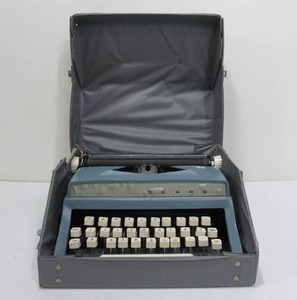 lot 65 image: Vintage Sears Portable Typewriter - Blue
