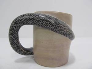 lot 94 image: Carved Stone Snake Handle Mug