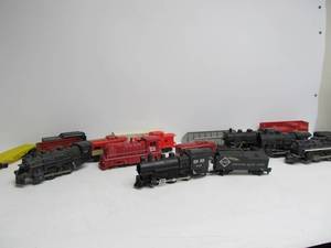 lot 152 image: Group of Assorted Vintage Lionel, MArx & American Flyer O Gauge Trains