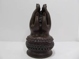 lot 258 image: Praying Hands With Embracing Buddha Terracotta Incense Burner