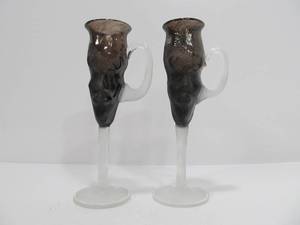 lot 308 image: Pair of Signed Sculptural Tall Flute Glasses wFaces