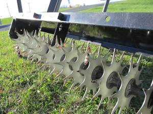 lot 372 image: 41 Long Tow Behind Lawn AeratorTiller