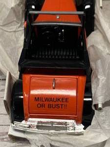 lot 27 image: Harley Davidson Limited Edition Model A Bank (cost $30 nearly 30 years ago)