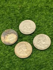Lot of 4 Franklin Half Dollars
