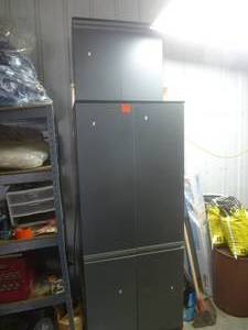 lot 83 image: Gray Cabinet South side Contents