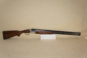 lot 11 image: TOZ-34E 12 Gauge OverUnder Shotgun - Engraved Receiver