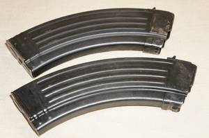 lot 19 image: (2) Metal 7.62x39 Magazines