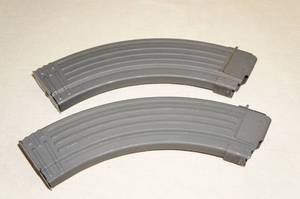 lot 20 image: (2) Metal 7.62x39 Magazines