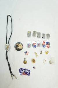 lot 15 image: Dog tags, pins, bowtie