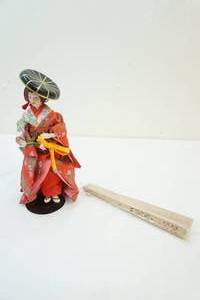 lot 32 image: Doll, fan