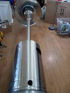 lot 53 image: 48000 BTU Stainless Steel Patio Heater by Hampton Bay- slighltly damaged & used