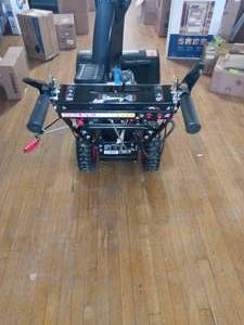 lot 105 image: 24 in. Two-Stage Gas Snow Blower with Electric Start by Legend Force- not used