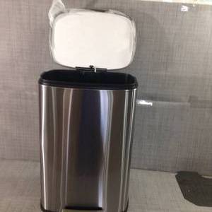 lot 32 image: SW 13 gal. Stainless Steel Step-On Trash Can Rectangle by StyleWell- open box not used - slightly damaged