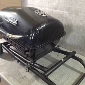lot 46 image: Portable Charcoal Grill in Black by Dyna-Glo- open box not used- slighltly damaged