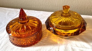 lot 69 image: Two Vintage Amber & Orange Colored Glass Covered Dishes