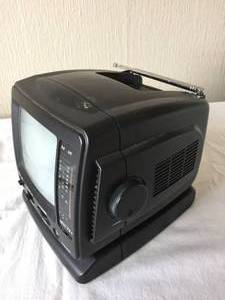 lot 348 image: Spectra 5 Inch Battery Operated  Electric Black And White TV