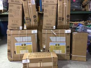 Lot of assorted Base Cabinets various sizes and styles see pictures customer returns see pictures