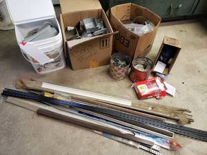 lot 63 image: Boxes of Electrical Componets, Boxes, Fittings, Honeywell Programmable Thermostat, Seam Binder, Trim Covering, Brackets & More