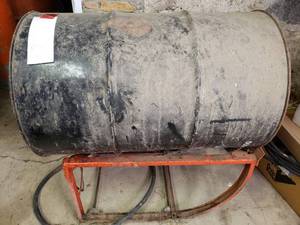 lot 59 image: Empty Metal Drum on Stand With Wheels See Photos