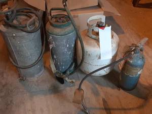 lot 100 image: (2) Vintage Sprayers, Vintage Fire Extinguisher, and Vintage Propane Tank Has Fuel See Photos