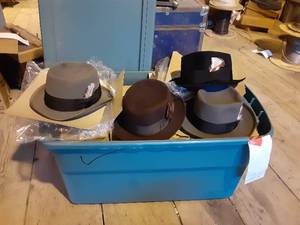 lot 200 image: Large Covered Tote Full of Hats in Packaging See Photos