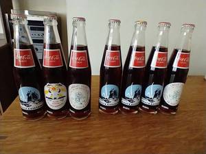 lot 11 image: North Dakota Centennial Coke Bottles