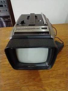 lot 17 image: Vintage Quasar Portable TV
