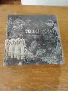 lot 18 image: To The Moon RecordBook Set