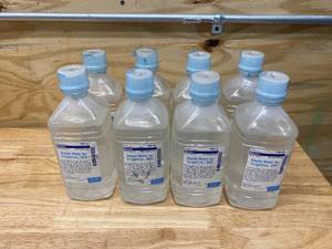 lot 35 image: BAXTER Lot of 8 Bottles of-  Sterile Water for Irrigation,  USP (1000 mL per bottle)