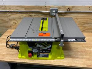 lot 69 image: RYOBI RTS10NS 15 amp, 10 Table Saw
