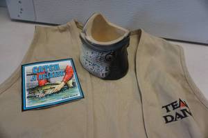 lot 186 image: Team Daiwa Fishermans Vest With Fish Head Can Cooler