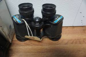lot 81 image: Tasco Model 318 7 x 35mm Binoculars With Case