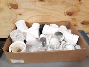 lot 517 image: NEW Box of 3 Sch40 Sanitary Double Wyes and More PVC Pipe Fittings