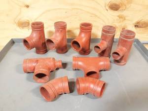 lot 542 image: NEW Lot of 9 Victaulic  Gruvlok Pipe Tees & Elbows 2-12