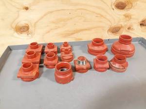 lot 549 image: NEW Lot of 13 Victaulic  Gruvlok Reducer Fittings