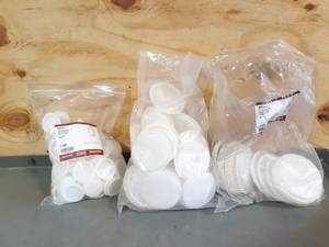 lot 581 image: Large Lot of Plastic Knockout Test Plugs - 1-12, 3 & 4