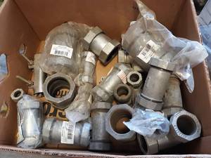lot 592 image: NEW Lot of Galvanized Compression Pipe Couplers 2 to 34 Pipe
