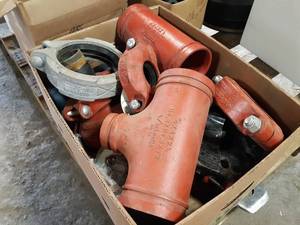 lot 615 image: Box of Assorted Victaulic Type Fittings and More