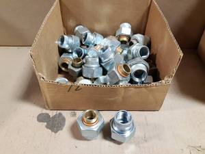lot 704 image: Box Lot of (34) 12 FPT Watts Dielectric Sweat Unions w EPDM Gaskets