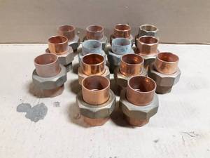 lot 710 image: Lot of (14) Brass  Copper 1-14 Unions
