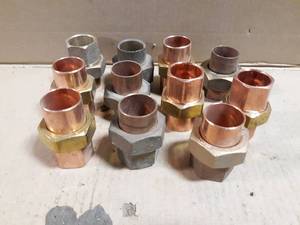 lot 711 image: Lot of (11) Brass  Copper 1 Unions