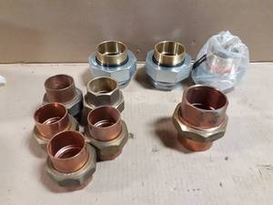 lot 714 image: Lot of (3) 2 Dielectric Unions, (5) 1-12 Copper  Brass Unions & (1) 2 Copper  Brass Union