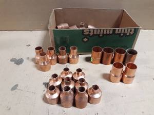 lot 716 image: Large Lot of (45) Assorted 1-14 Copper Pipe Reducers